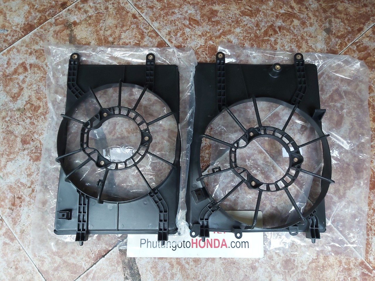 Lồng quạt két nước xe Honda City